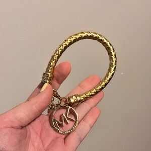 Michael Kors Gold Rope Textured Bangle Bracelet with MK charm